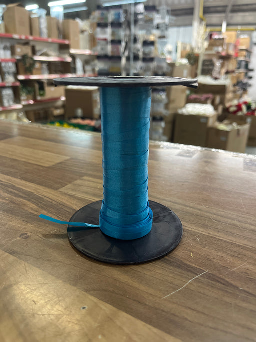 Tiny bit left of Curling Ribbon - turquoise
