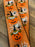 1 Metre Wired Halloween Pumpkin Ribbon - Orange/Black/White (60mm width)