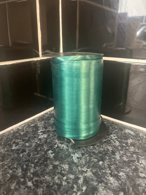 Reduced almost a full roll of Curling Ribbon - green