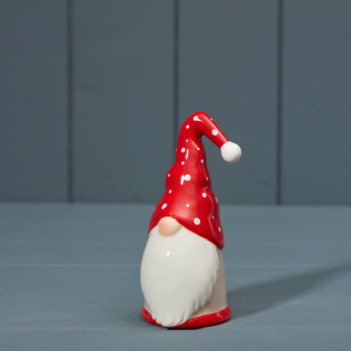 Red and White Ceramic Santa