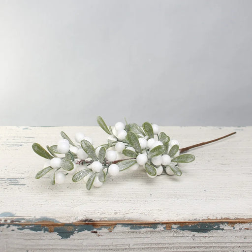 Frosted white berry spray with leaves