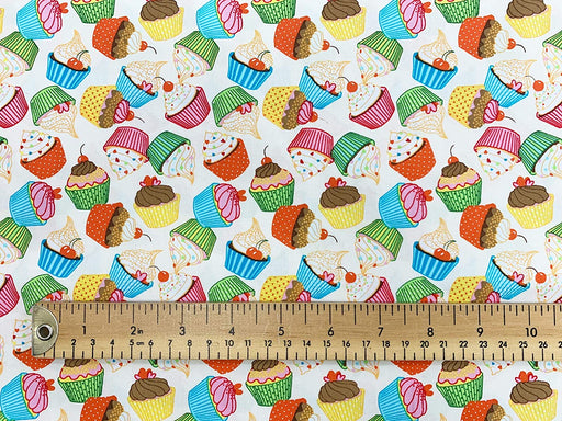 1M 100% Cotton Poplin Cupcakes on Cream Fabric Width: 110cm (45 inches) stock location b3