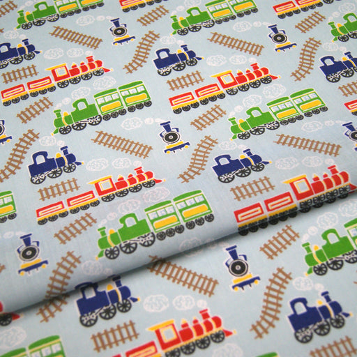 1 Metre Polycotton Train Fabric on Baby Blue Background - 45" Width T211