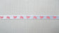 10mmx20m grosgrain pink footprint ribbon